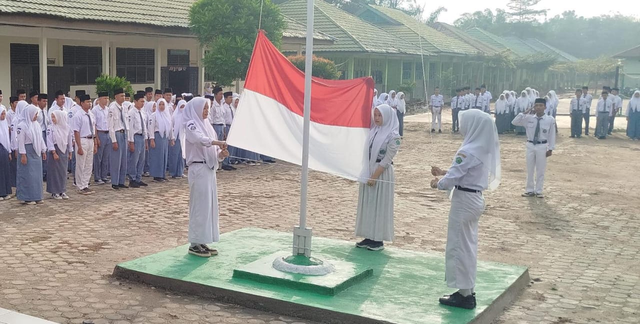 Kesuksesan Tim Pengibar Bendera Siswa Kelas XI A