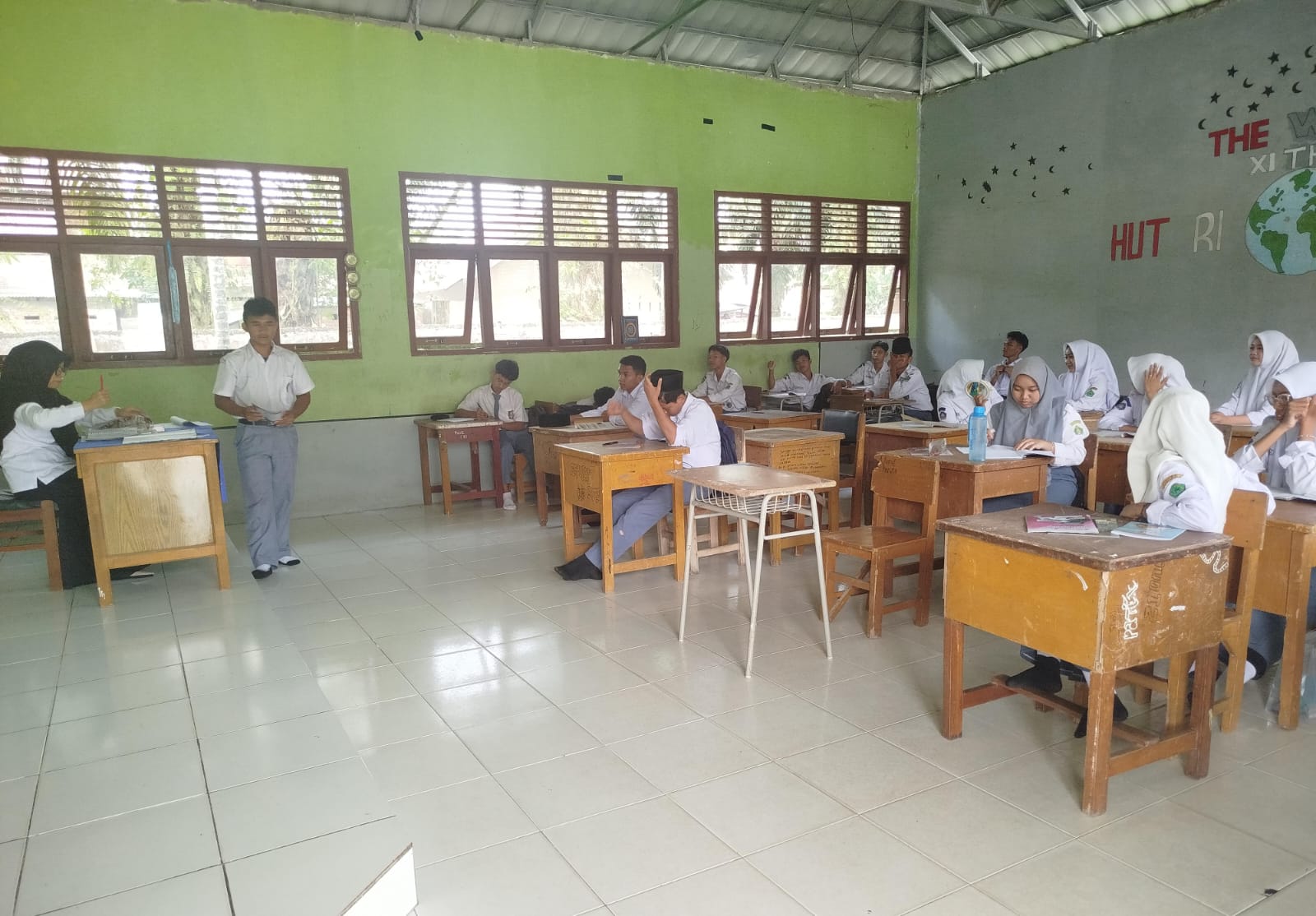 Wanita Tangguh Pimpin Kelas XI E 